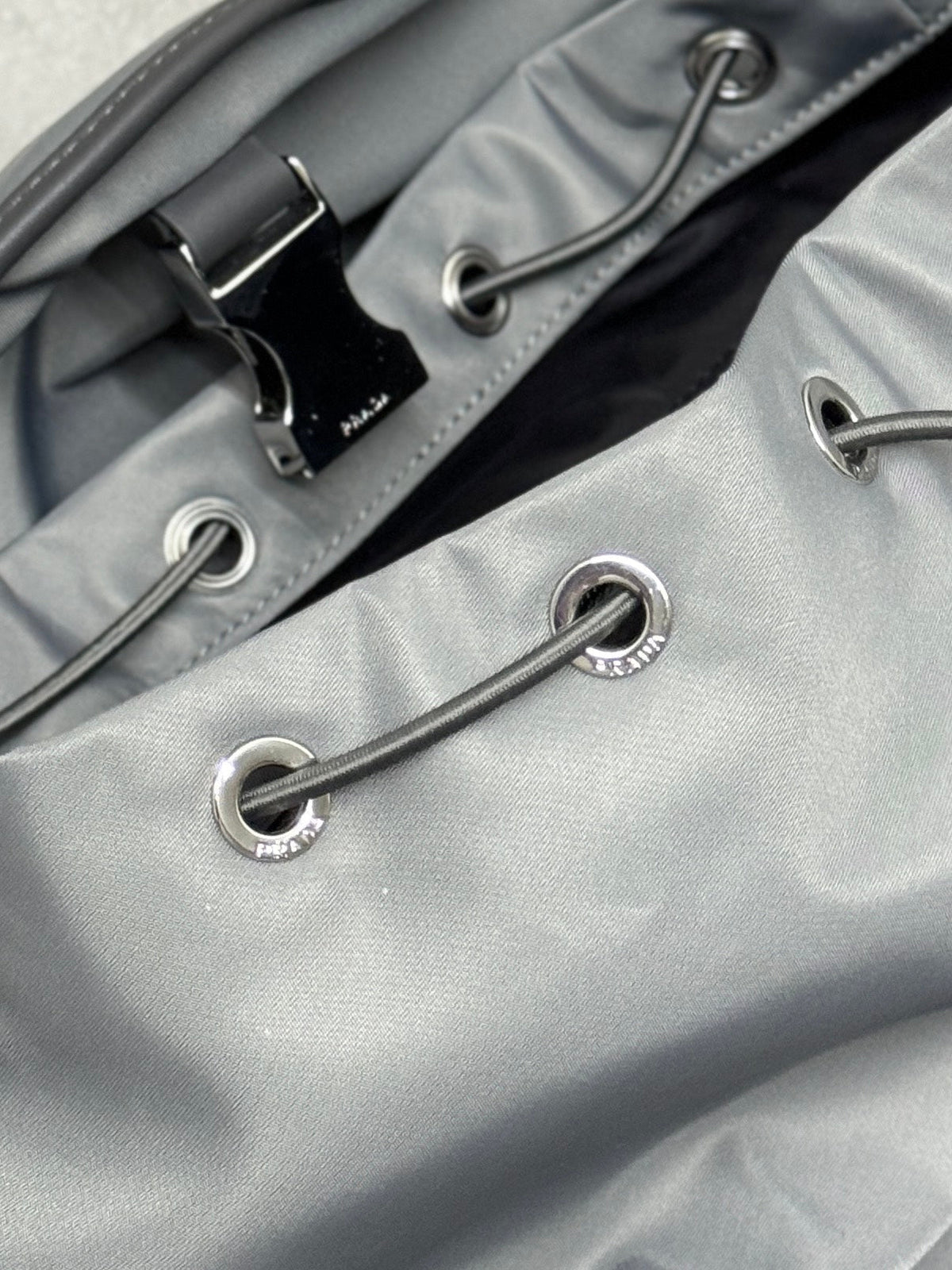PRADA TRIANGLE LOGO BACKPACK 42 IN RHINO GRAY RE-NYLON